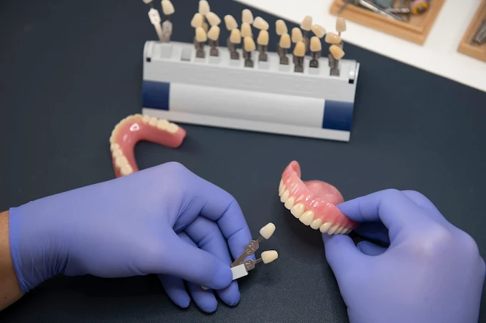Hancock Denture Clinic prosthetist crafting a custom denture